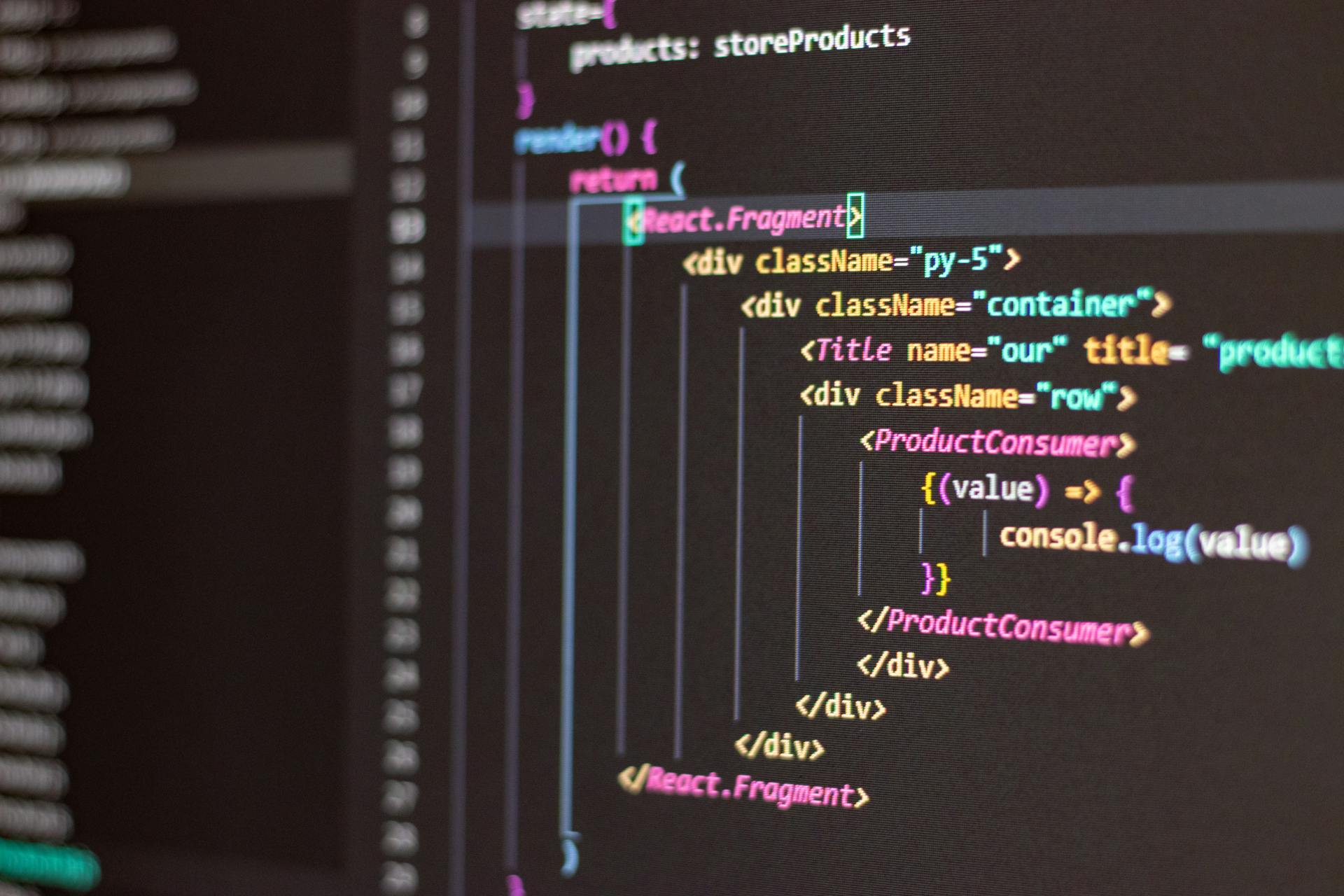 Close-up of HTML and JavaScript code on a computer screen in Visual Studio Code